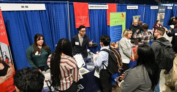 A crowd of students gathered at a career information fair.