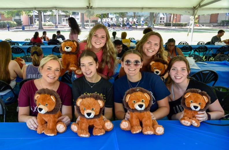 Students with stuffed animals